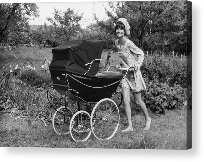 Children Acrylic Print featuring the photograph Audrey Hepburn Pushing A Pram by Henry Clarke
