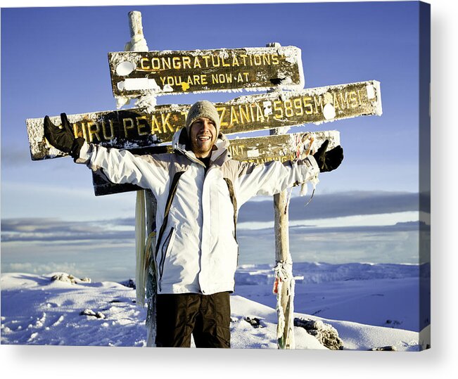 Young Men Acrylic Print featuring the photograph Climber at the Top of Mount Kilimanjaro by Ranplett