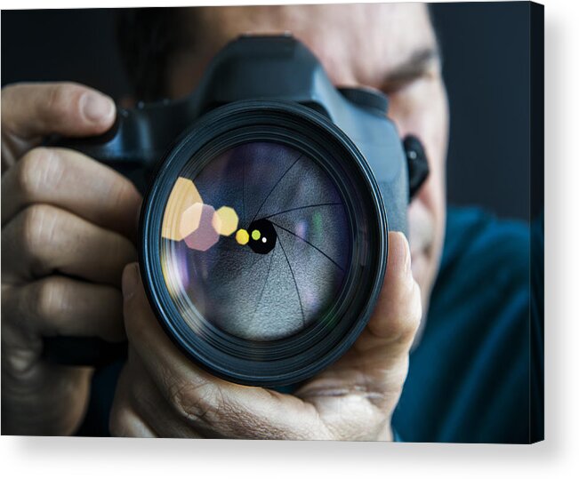 Mature Adult Acrylic Print featuring the photograph Man holding camer, close-up of lens by Dimitri Otis