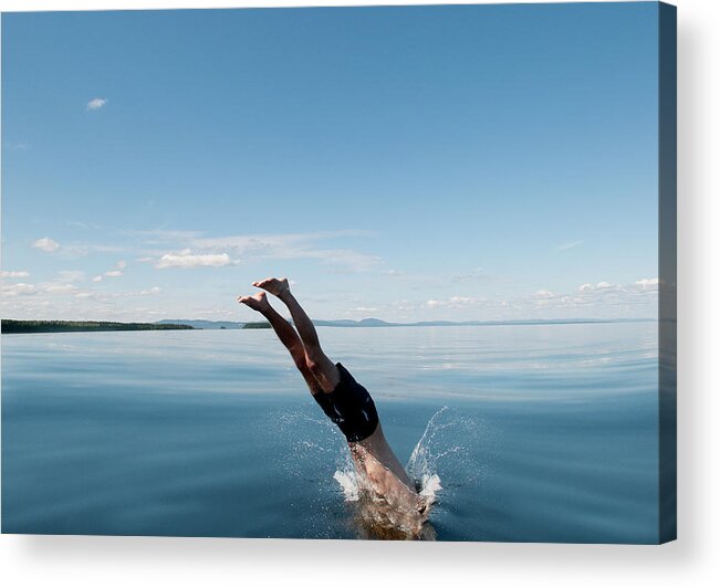 Scenics Acrylic Print featuring the photograph Mature Man Jumping In Sea by Johner Images