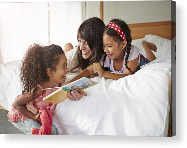 4-5 Years Acrylic Print featuring the photograph Mother & 2 kids lauging & reading in bedroom by Klaus Vedfelt