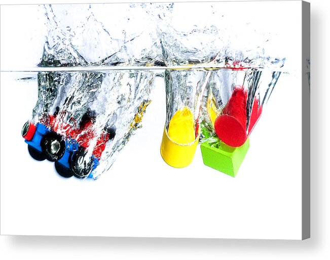 Toys Acrylic Print featuring the photograph Wooden toys in water by Mike Santis