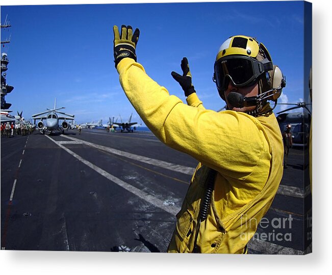 Horizontal Acrylic Print featuring the photograph An Aviation Boatswains Mate Directs #1 by Stocktrek Images