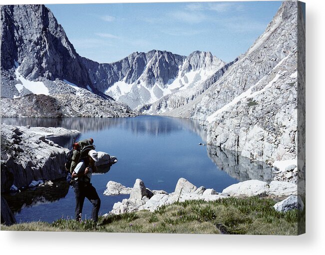 Hiker Alpine Lake High Sierras Acrylic Print featuring the photograph Hiking the High Sierra by John Farley