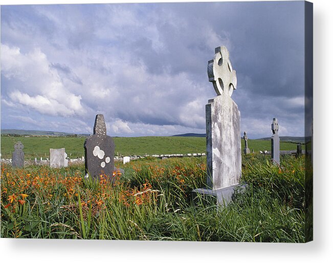 Headstones Wildflowers Blustery Skies Acrylic Print featuring the photograph Mayo Cemetery by John Farley
