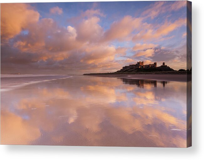 Bamburgh Castle Acrylic Print featuring the photograph Bamburgh Castle sunset reflections on the beach by Anita Nicholson