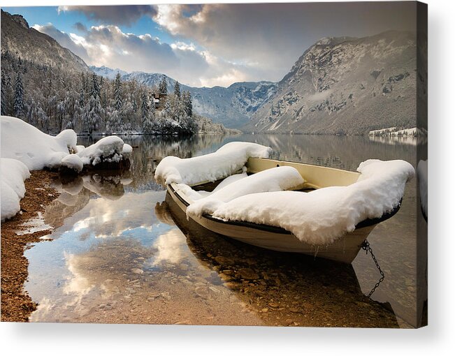 Bohinj Acrylic Print featuring the photograph Snow covered boat on Lake Bohinj in Winter by Ian Middleton