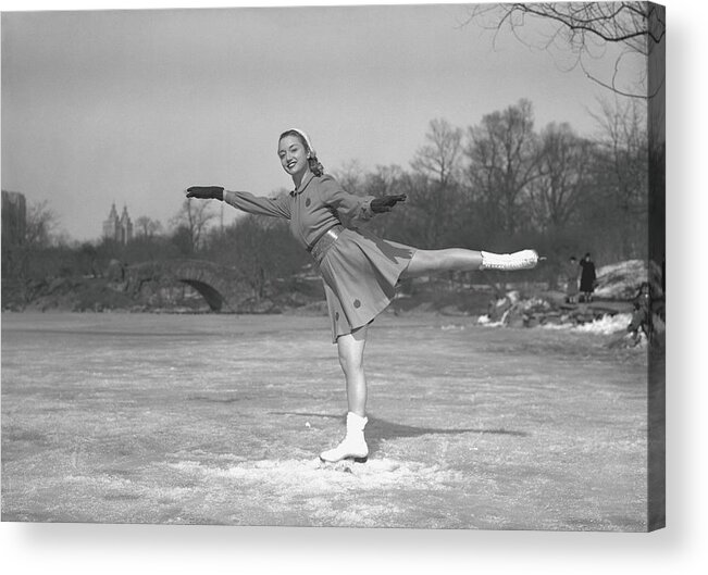 Human Arm Acrylic Print featuring the photograph Woman Ice Skating Outdoors, B&w by George Marks