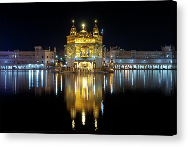 Indian Subcontinent Ethnicity Acrylic Print featuring the photograph Golden Temple At Night In Amritsar by Yoav Peled