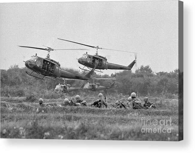 Vietnam War Acrylic Print featuring the photograph Helicopters Unloading Soldiers In South by Bettmann