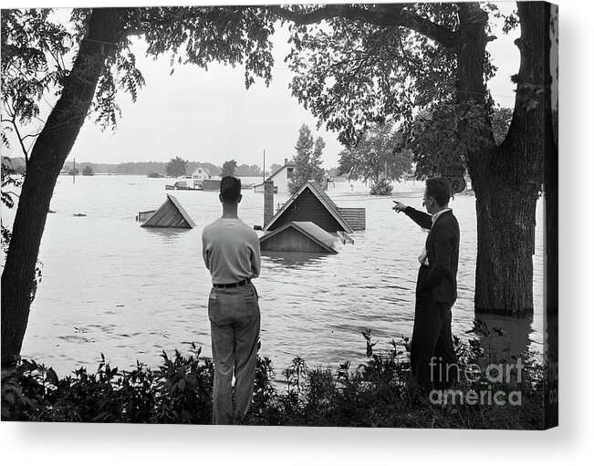 People Acrylic Print featuring the photograph Man Pointing To Attic Flooded By River by Bettmann