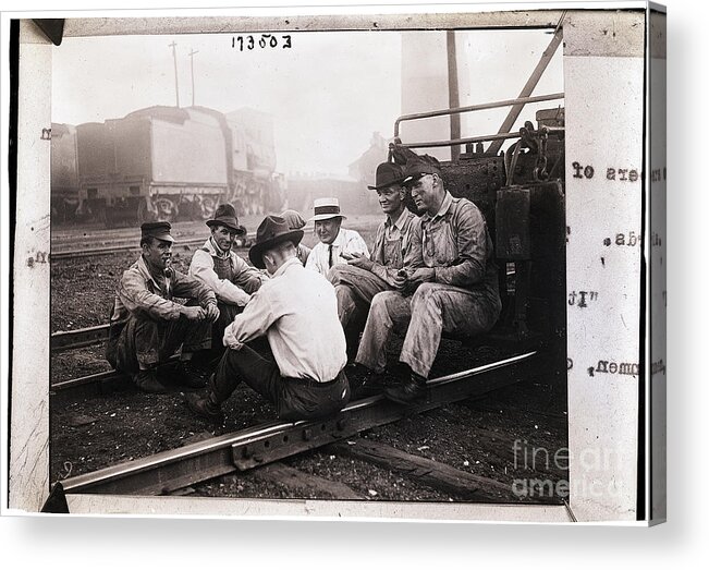 People Acrylic Print featuring the photograph Union Men Talking In Train Yard by Bettmann