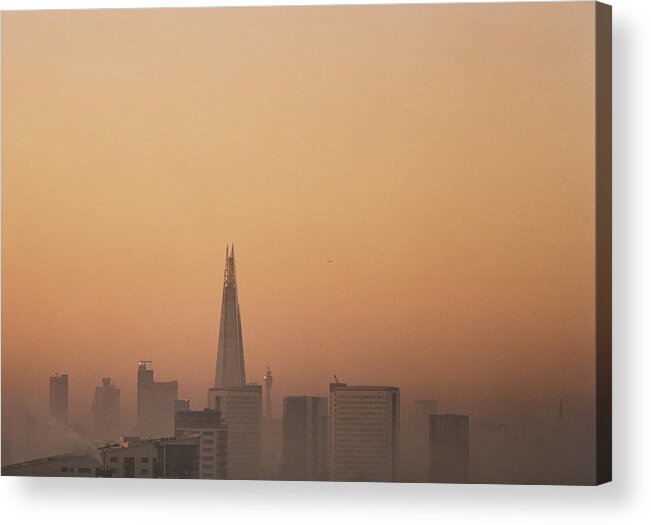Orange Color Acrylic Print featuring the photograph London city skyline with Shard in the mist #1 by Gary Yeowell