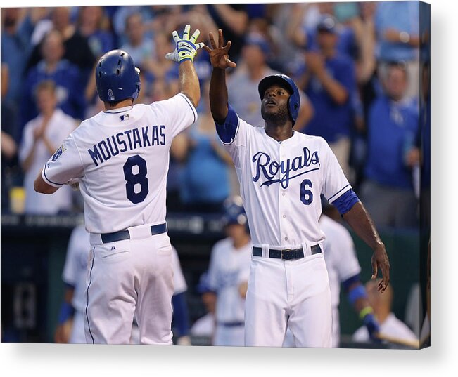 American League Baseball Acrylic Print featuring the photograph Mike Moustakas and Lorenzo Cain #1 by Ed Zurga