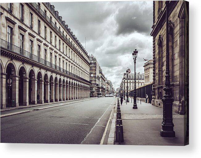 Empty Acrylic Print featuring the photograph Empty Rue De Rivoli street against dramatic sky in Paris by Kolderal