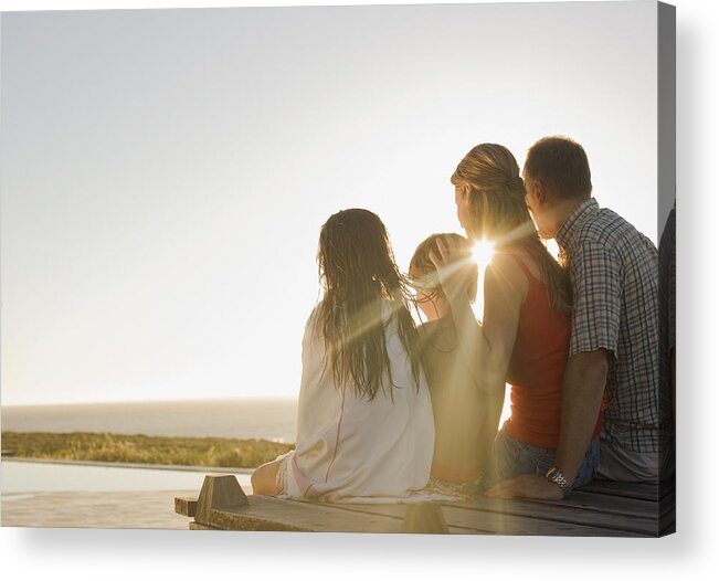 Mid Adult Women Acrylic Print featuring the photograph Family sitting on deck in afternoon sun by Sam Edwards
