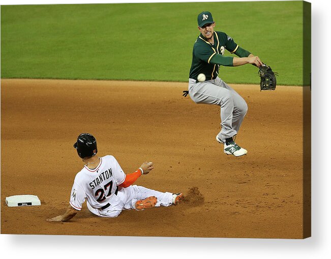 Double Play Acrylic Print featuring the photograph Jed Lowrie and Giancarlo Stanton by Mike Ehrmann
