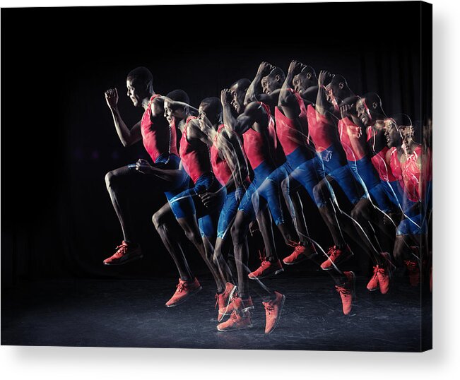 Taking Off Acrylic Print featuring the photograph Male athlete running by Henrik Sorensen