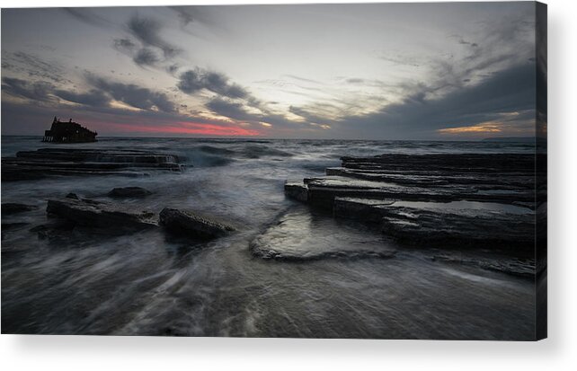 Seascape Acrylic Print featuring the photograph Shipwreck of an abandoned ship on a rocky shore by Michalakis Ppalis