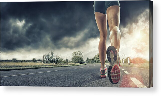 Recreational Pursuit Acrylic Print featuring the photograph Rear View Of Runners Legs by Peepo