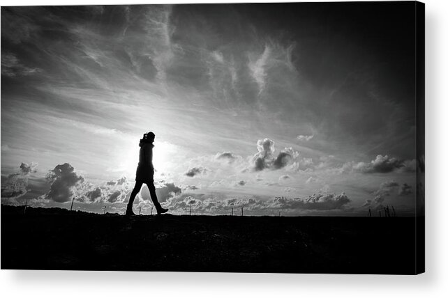 Black And White Acrylic Print featuring the photograph Walking alone - Howth, Ireland - Black and white street photography by Giuseppe Milo