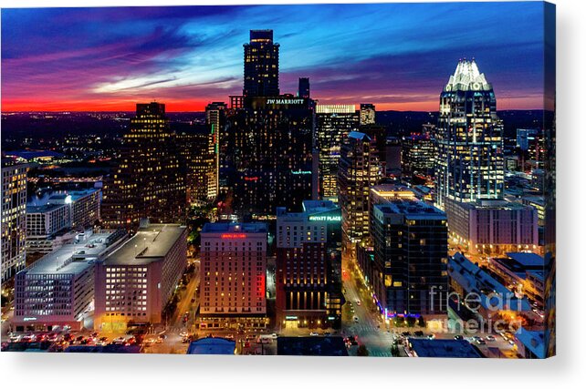 Austin Cityscape Acrylic Print featuring the photograph A gorgeous fiery sunset engulfs the sky over the downtown Austin by Dan Herron