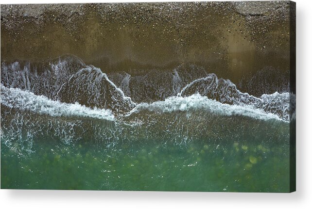 Waves Acrylic Print featuring the photograph Aerial view ocean waves braking on a sandy beach. Nature background by Michalakis Ppalis