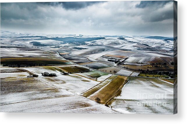 Above Acrylic Print featuring the photograph Aerial View Of Winter Landscape With Remote Settlements And Snow Covered Fields In Austria by Andreas Berthold