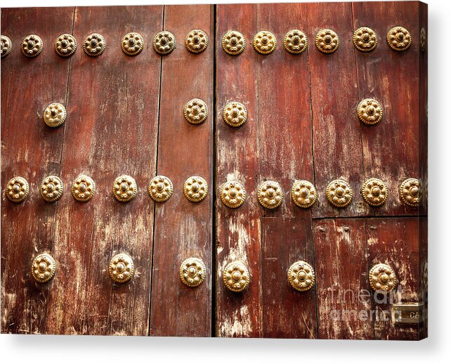Door Details In Seville Acrylic Print featuring the photograph Door Details in Seville by John Rizzuto
