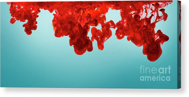 Abstract Acrylic Print featuring the photograph Abstract color paint splash on blue background. Red ink in water by Jelena Jovanovic