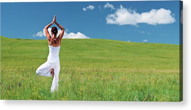 Scenics Acrylic Print featuring the photograph Young Woman Practicing Yoga #1 by Hadynyah