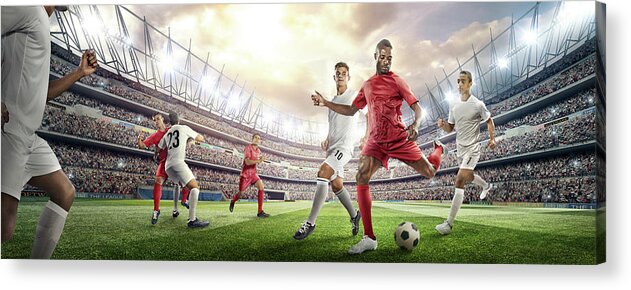 Soccer Uniform Acrylic Print featuring the photograph Soccer Player Kicking Ball In Stadium #3 by Dmytro Aksonov