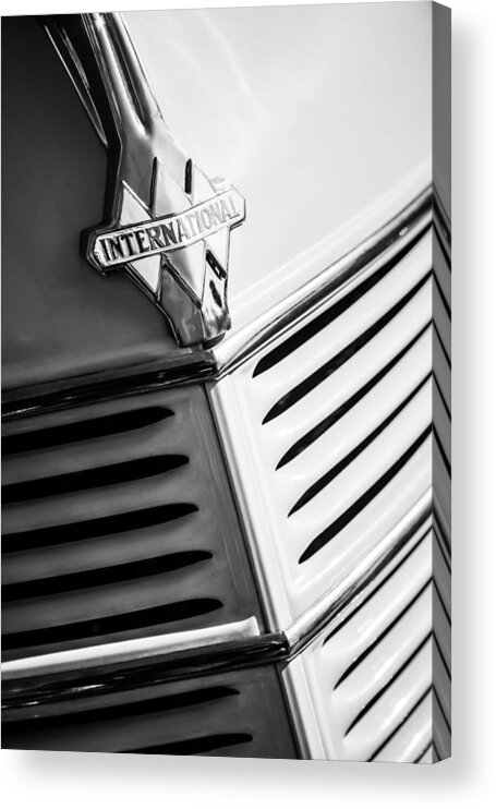 1940 International D-2 Station Wagon Grille Emblem Acrylic Print featuring the photograph 1940 International D-2 Station Wagon Grille Emblem by Jill Reger