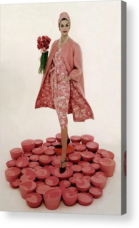 Fashion Acrylic Print featuring the photograph A Model Wearing A Matching Pink Outfit Holding by William Bell