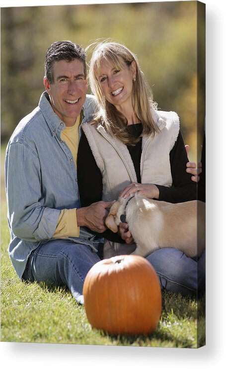 Three Quarter Length Acrylic Print featuring the photograph Couple with dog by Comstock Images