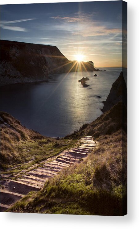 An Autumnal Sunrise At Man Owar Bay; An Open Coastline That Was Fashioned From Two Beaches That The Sea Joined Together Acrylic Print featuring the photograph First Light at Man 'oWar Bay by Chris Frost