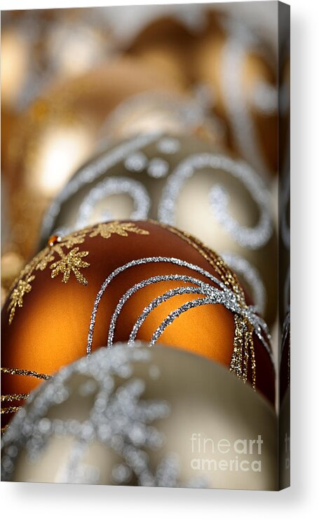 Christmas Acrylic Print featuring the photograph Gold Christmas ornaments by Elena Elisseeva