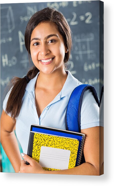 Asian And Indian Ethnicities Acrylic Print featuring the photograph Portrait of cute preteen Indian student in math class by Steve Debenport