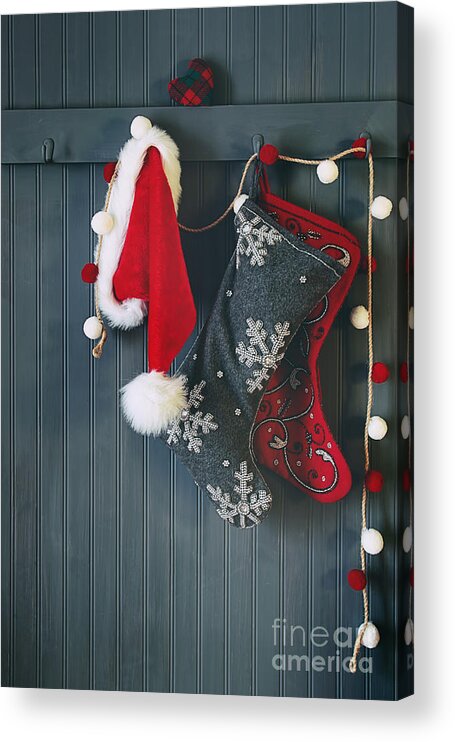 Christmas Acrylic Print featuring the photograph Stockings hanging on hooks for the holidays by Sandra Cunningham