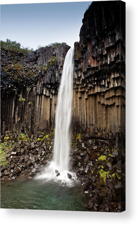 Scenics Acrylic Print featuring the photograph Svartifoss Waterfall Cascading Over by Richard I'anson
