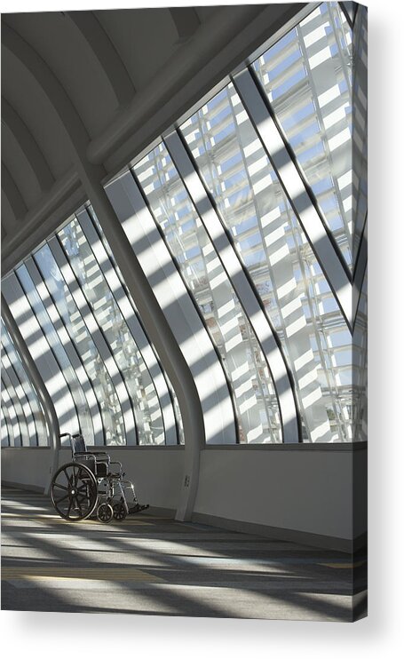 Medical Equipment Acrylic Print featuring the photograph Wheelchair in hallway by Comstock Images