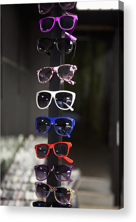 Vertical Acrylic Print featuring the photograph Sunglasses On Display In A Store by Halfdark