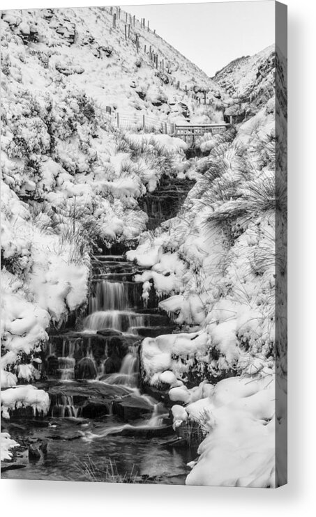 Black And White Acrylic Print featuring the photograph Snowy waterfall in the Peak District in Derbyshire by Neil Alexander Photography