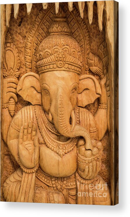 Ancient Acrylic Print featuring the photograph wood carving for Hindu god Ganesha on the wood. by Tosporn Preede