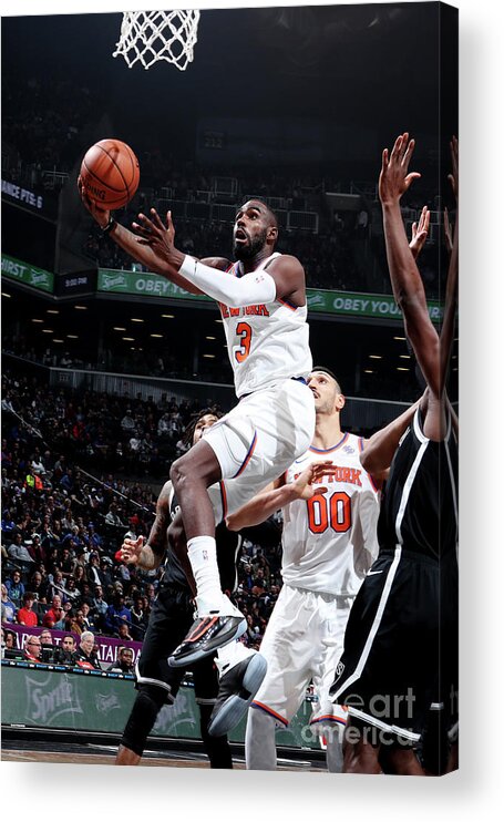 Tim Hardaway Jr. Acrylic Print featuring the photograph New York Knicks V Brooklyn Nets by Nathaniel S. Butler