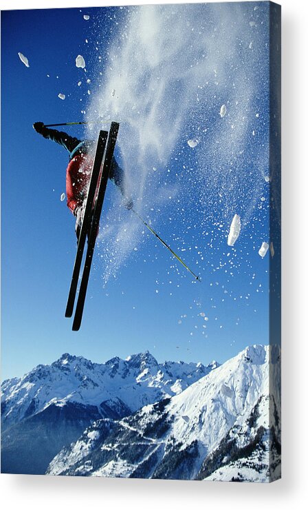 Skiing Acrylic Print featuring the photograph Downhill Skier In Mid-air, Rear View by Ross Woodhall