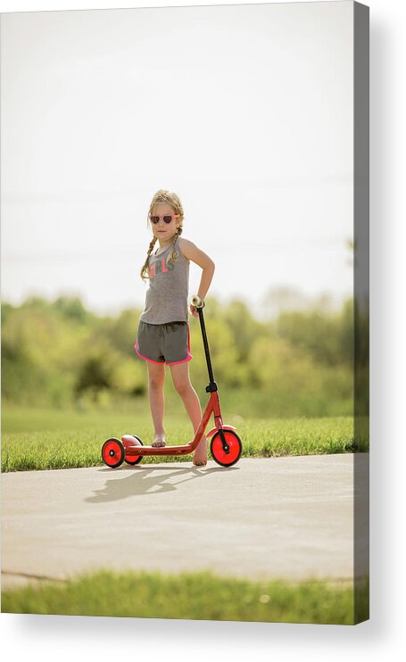 full length of confident girl wearing sunglasses while standing with push scooter on road cavan images