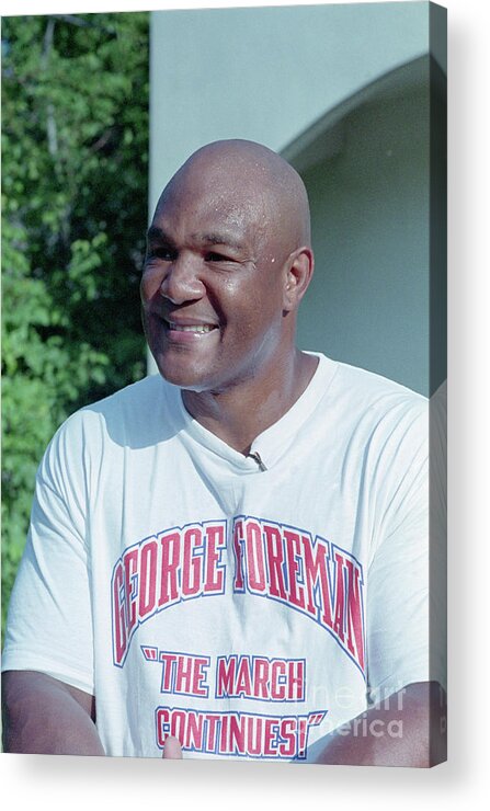 Following Acrylic Print featuring the photograph Grinning George Foreman by Bettmann