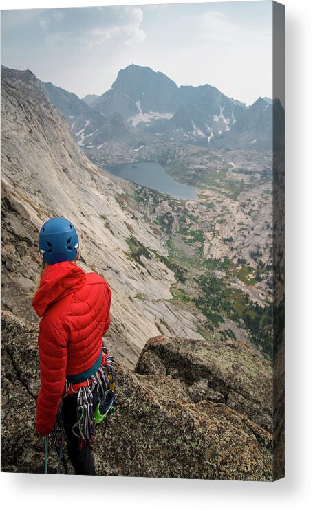 Hiker Acrylic Print featuring the photograph High Angle View Of Female Hiker With Mountain Climbing Equipment Standing On Cliff Against Sky by Cavan Images