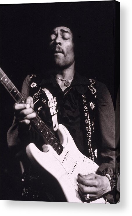 Rock And Roll Acrylic Print featuring the photograph Jimi Hendrix Performs by Hulton Archive